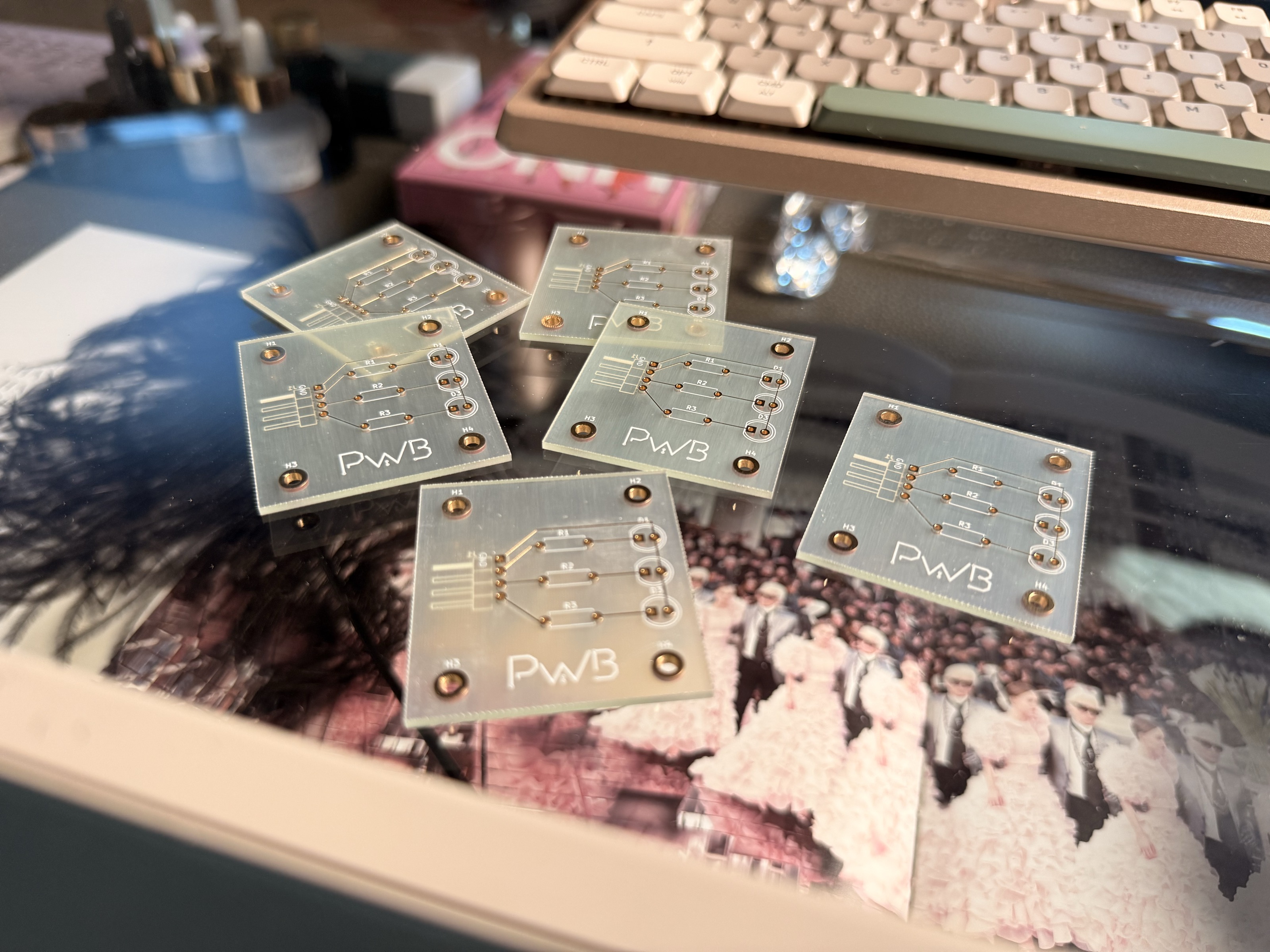 A cluster of custom Pretty Wired circuit boards — specimens from the collection.